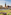 Dresden Hofkirche and Residenzschloss overlooking vibrant flower gardens.