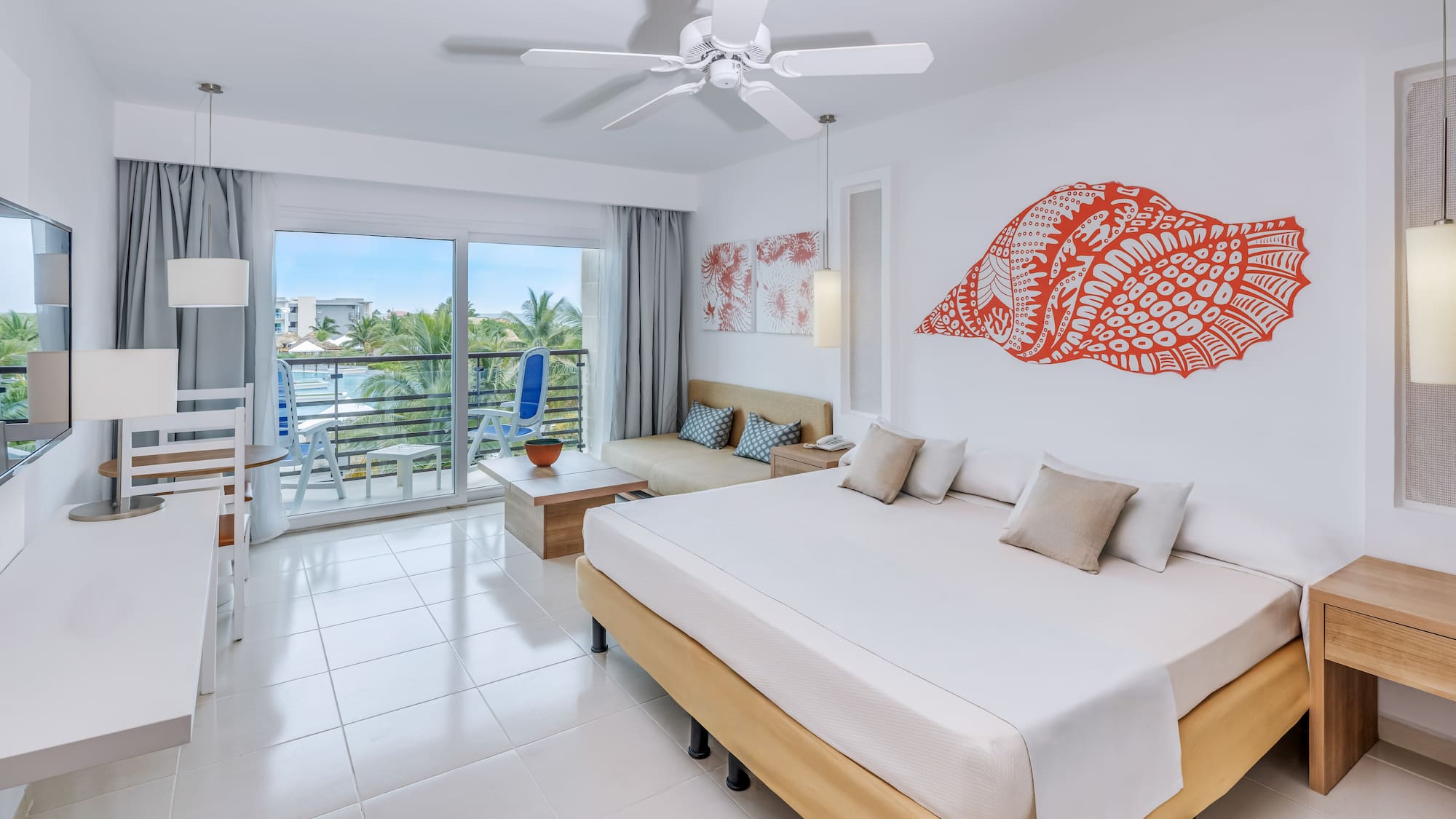 a room with a bed and a ceiling fan