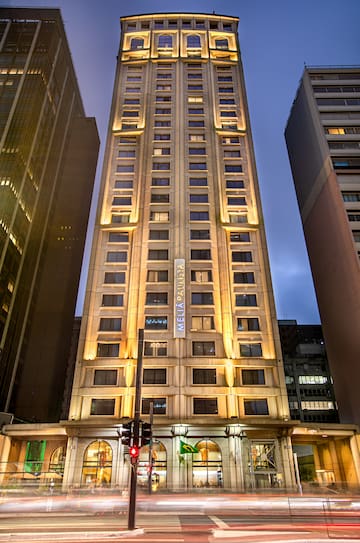 a tall building with lights on