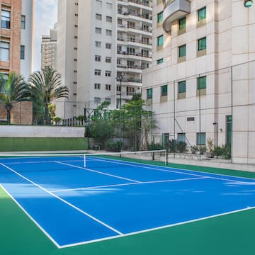 a tennis court in a city