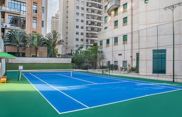 a tennis court in a city