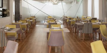 a room with tables and chairs