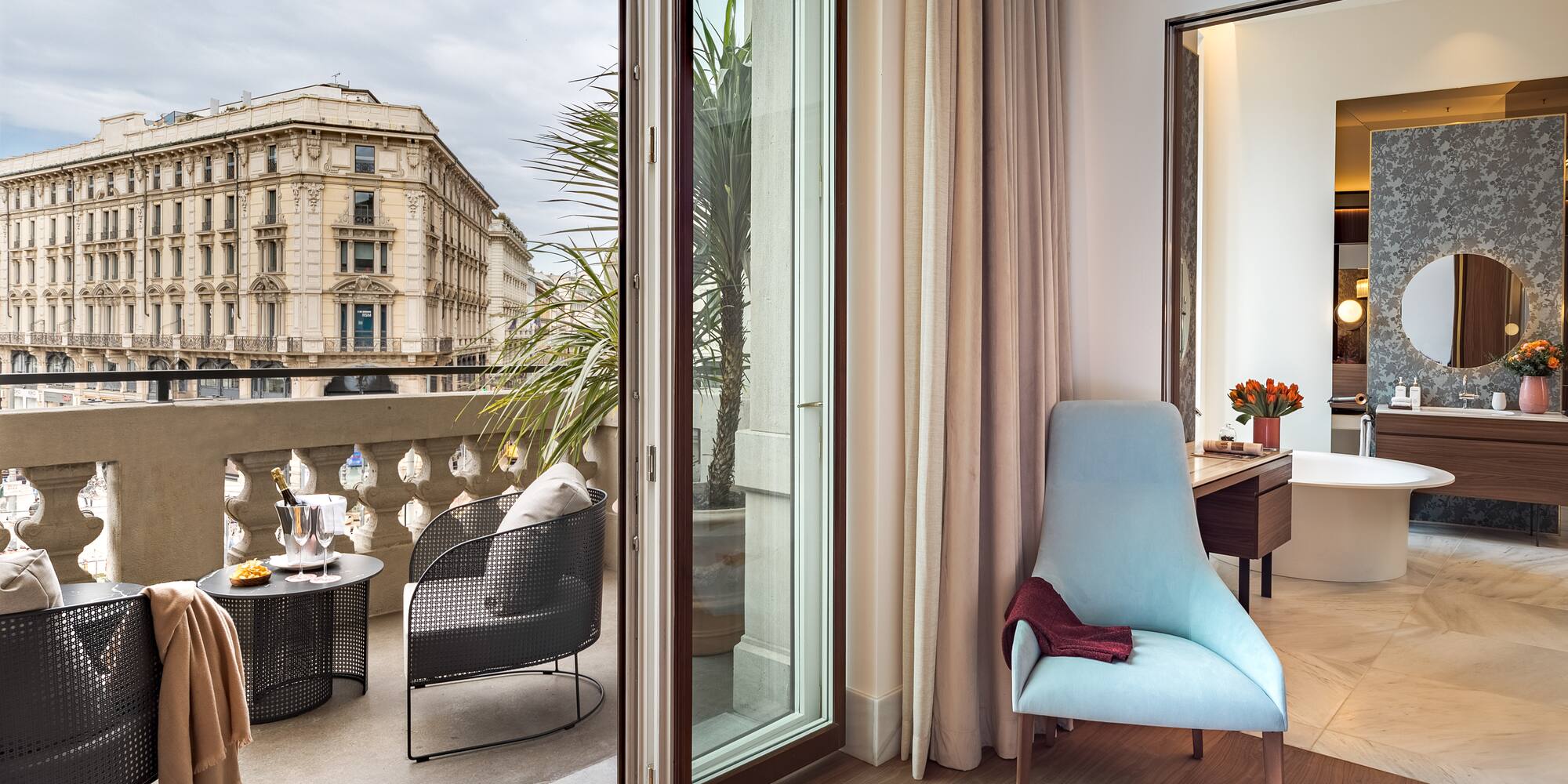 a room with a glass door and a chair and a table