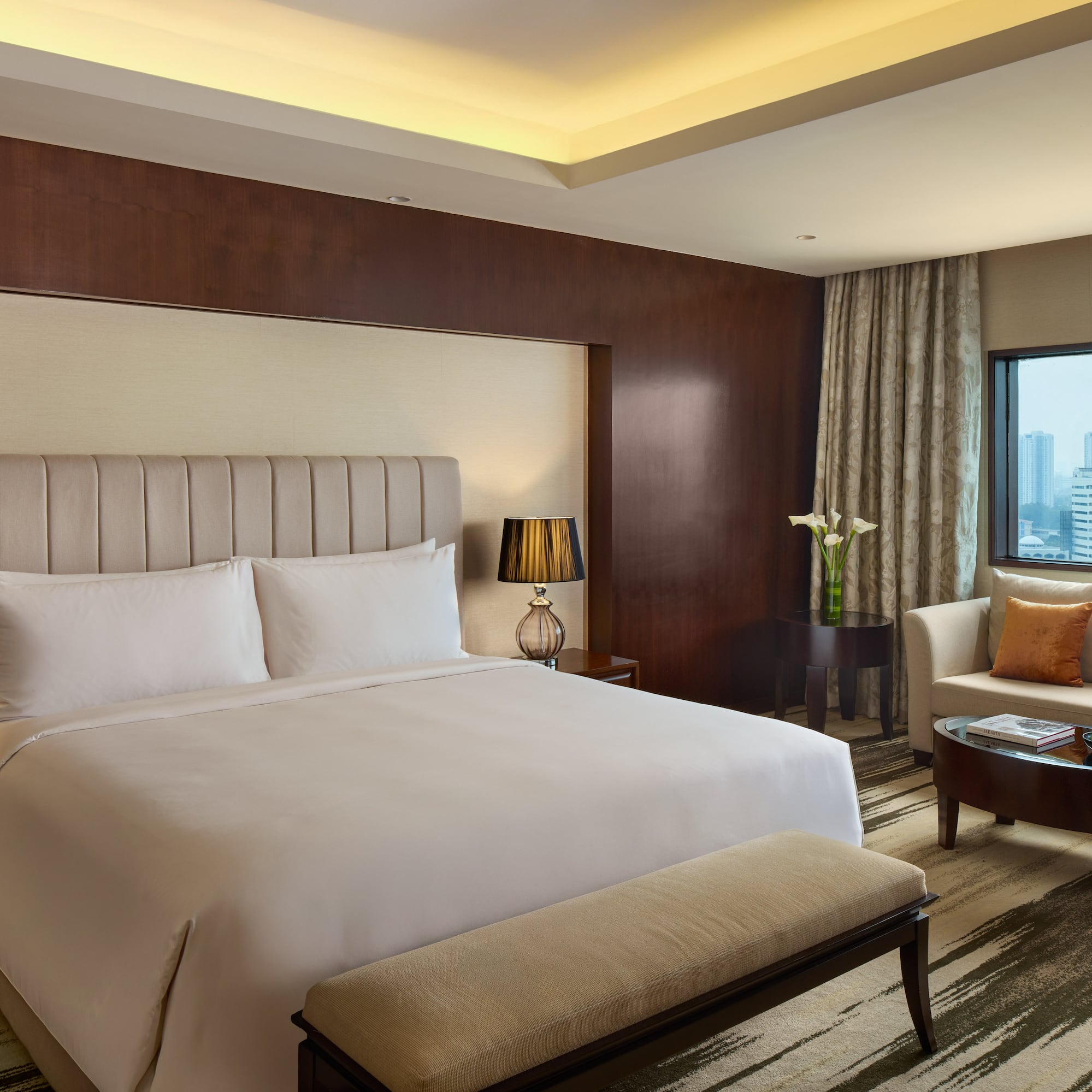 a room with a bed and a chair