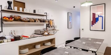 a room with a variety of objects on shelves