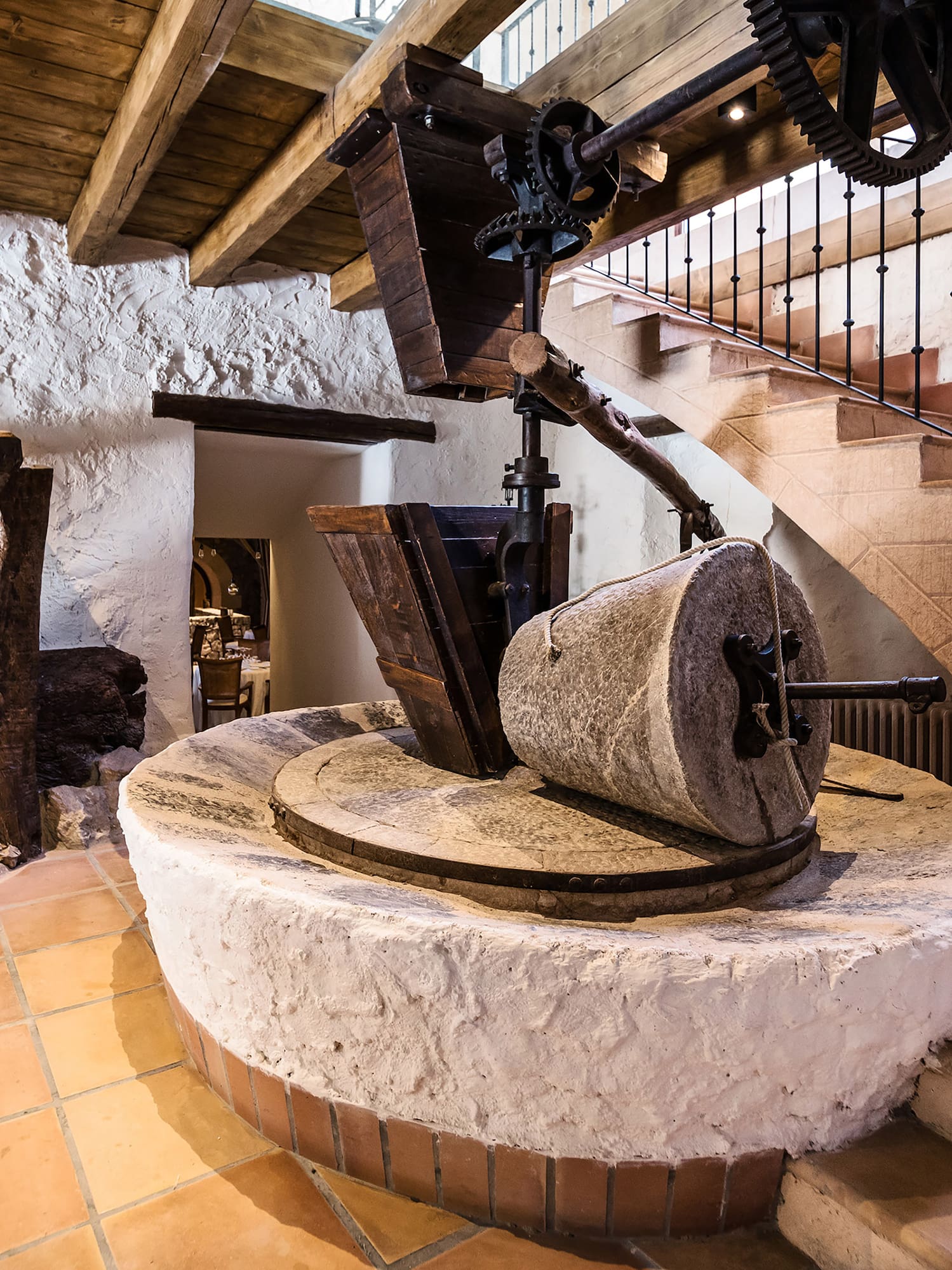 a stone mill with a large wheel