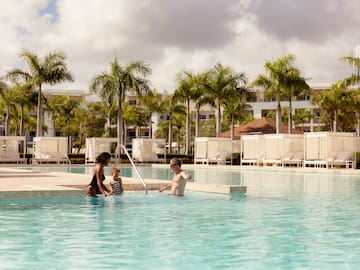 a group of people in a pool