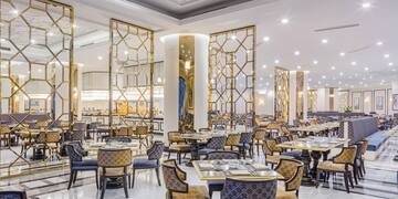 a restaurant with tables and chairs