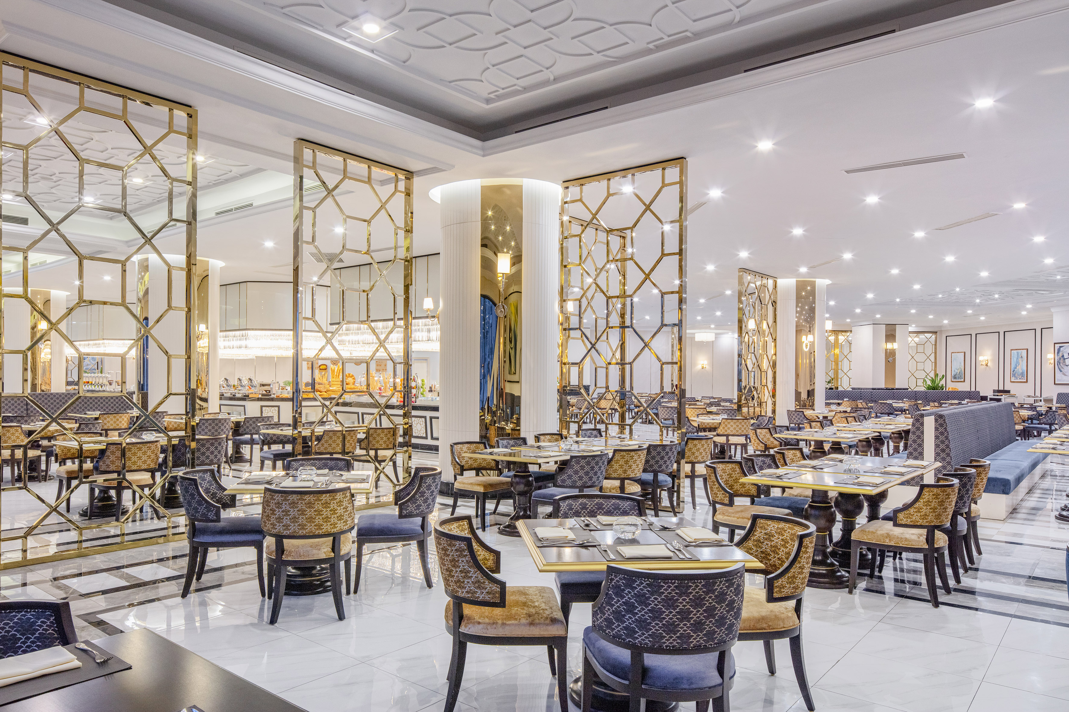 a restaurant with tables and chairs