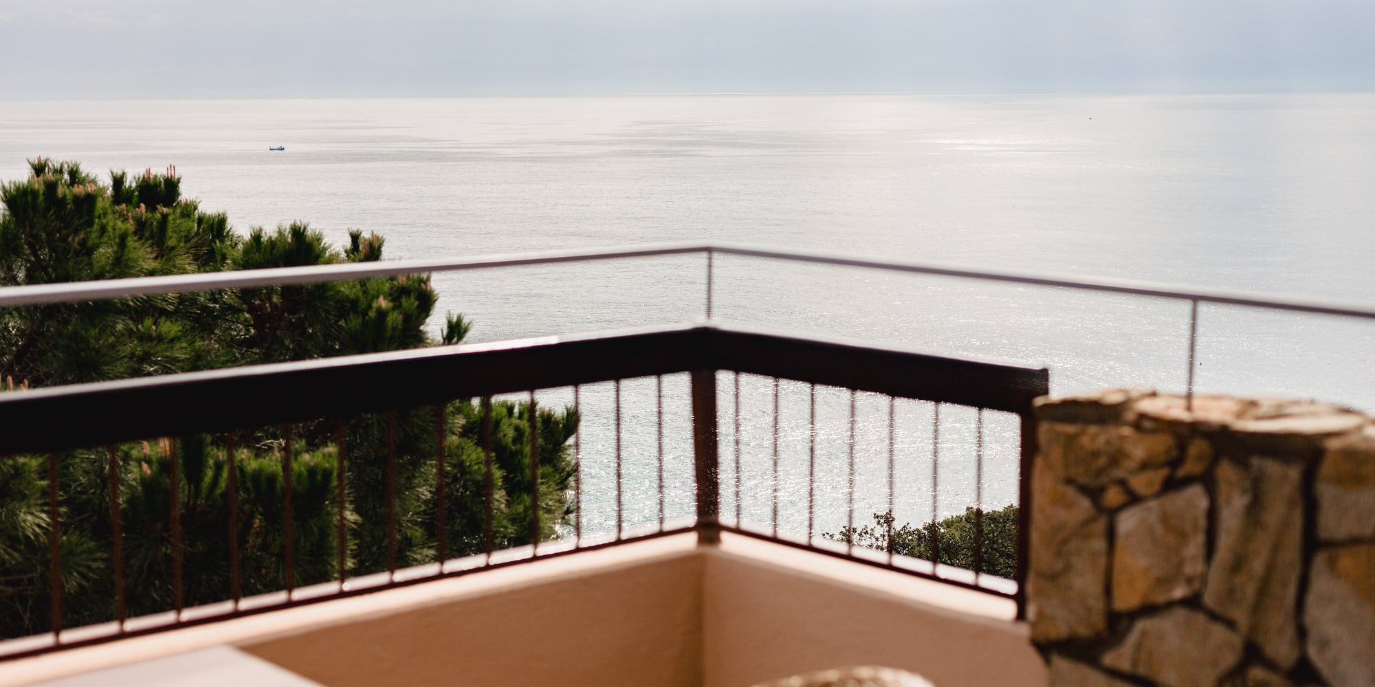 a balcony overlooking the ocean