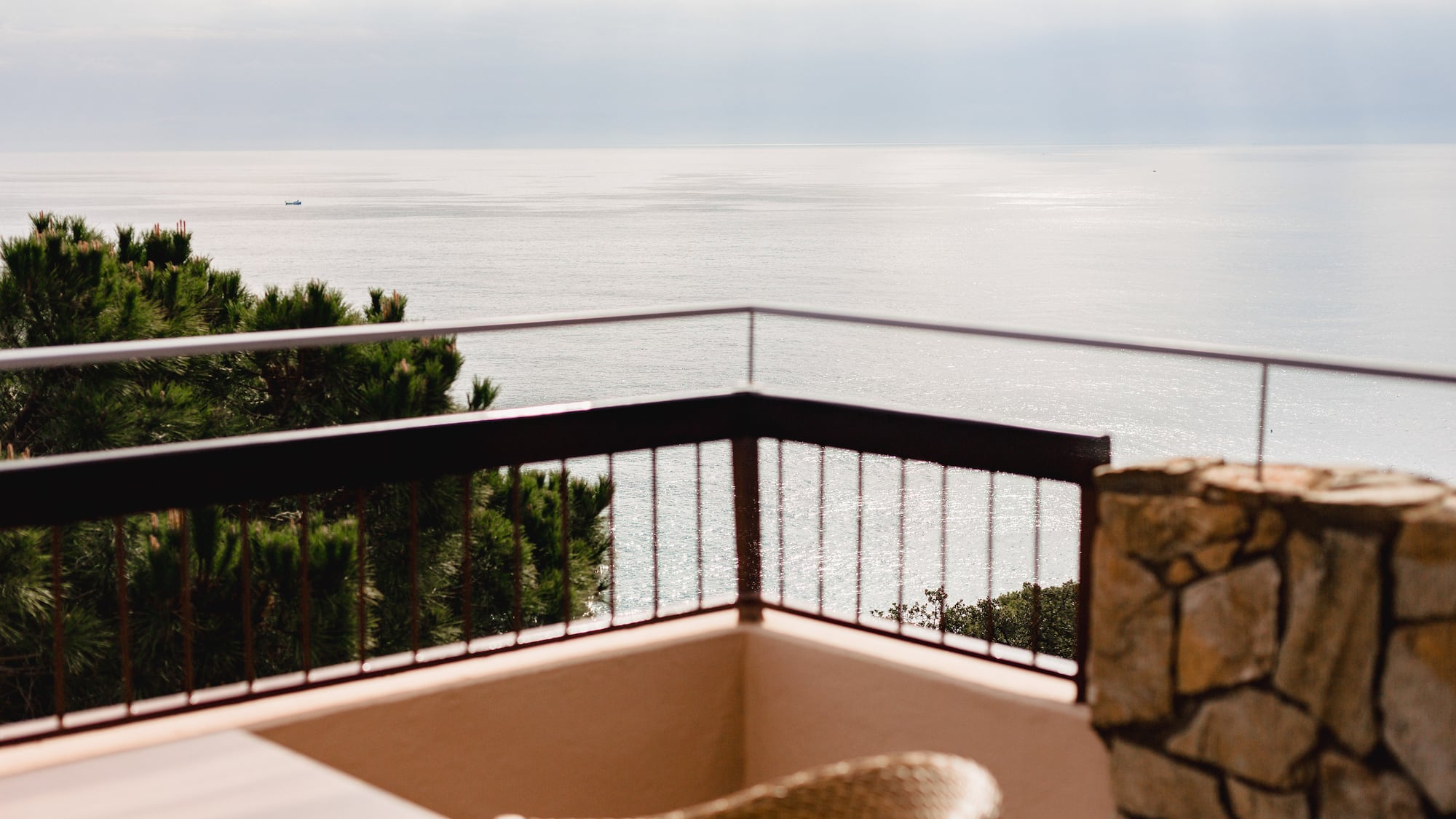 a balcony overlooking the ocean