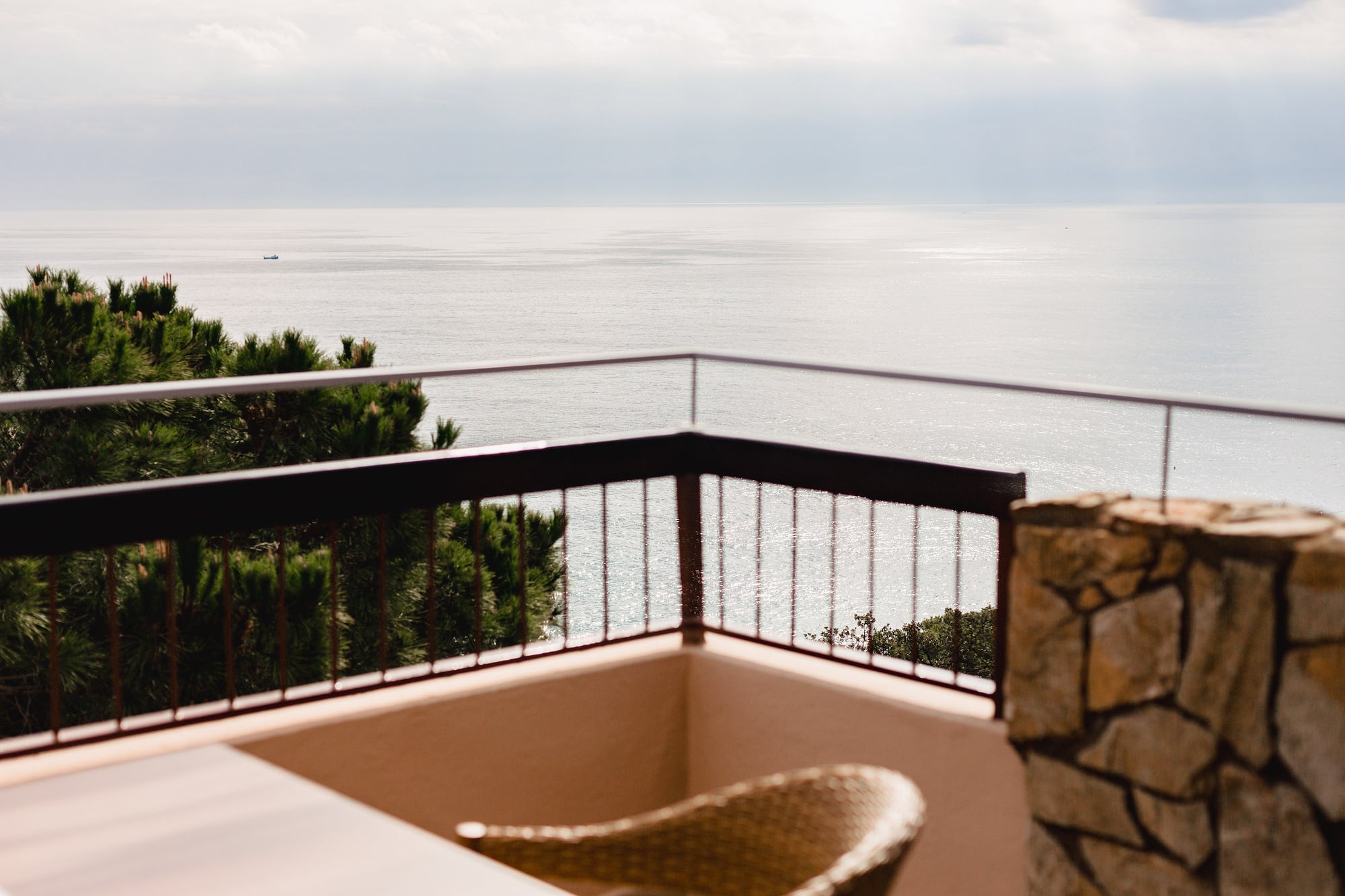 a balcony overlooking the ocean