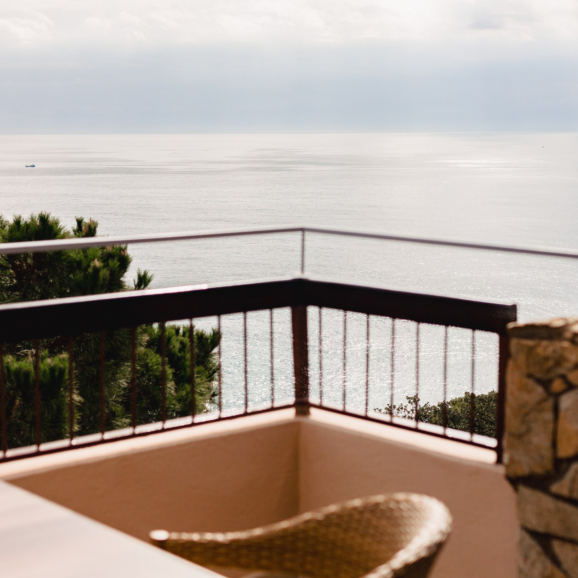 a balcony overlooking the ocean