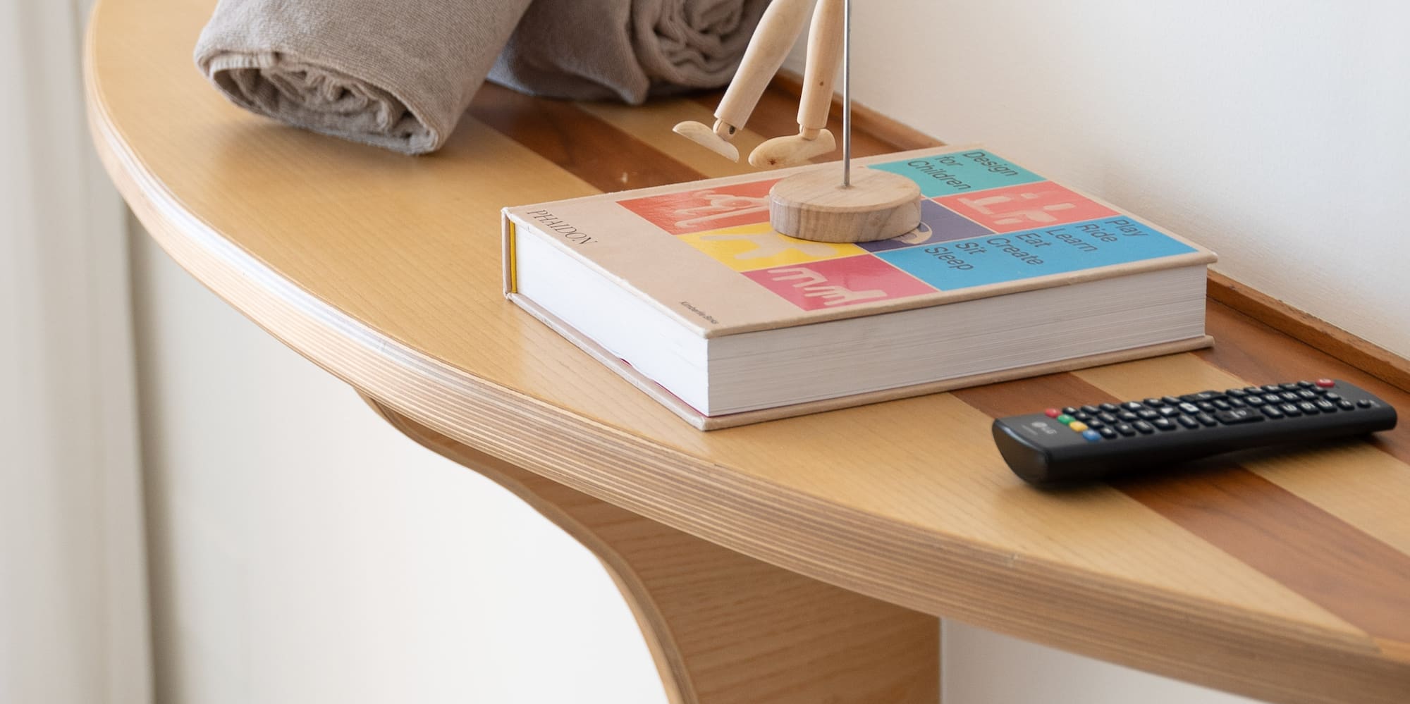 a wooden figurine on a table
