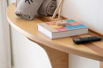 a wooden figurine on a table