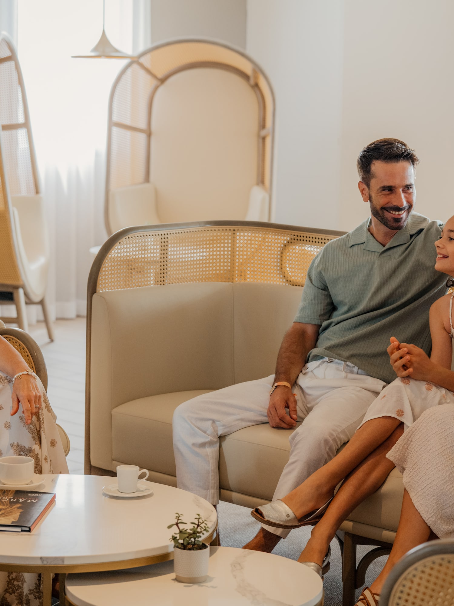 a man and woman sitting on a couch