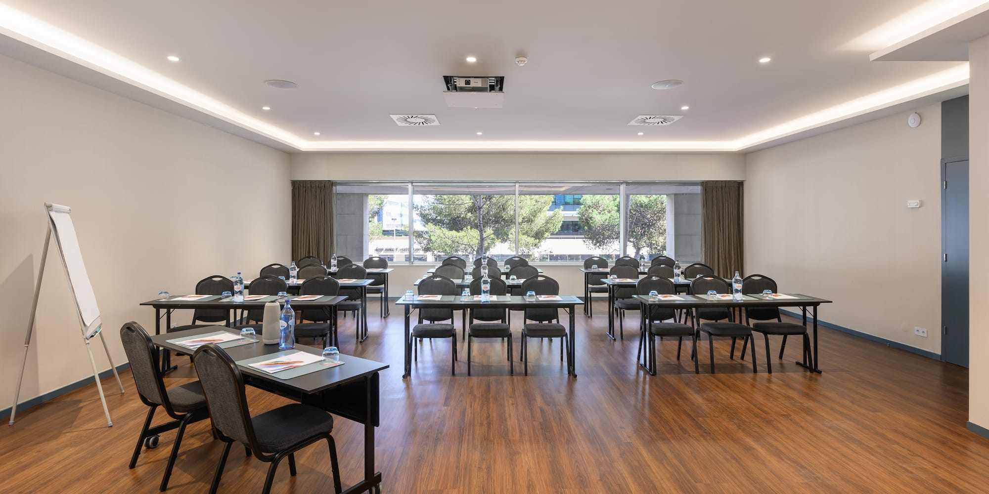 a room with tables and chairs