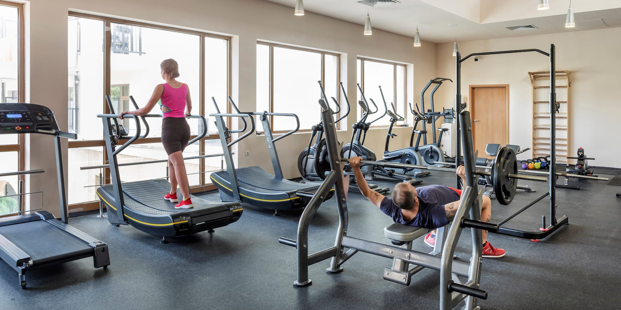 a man and woman in a gym