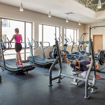 a man and woman in a gym