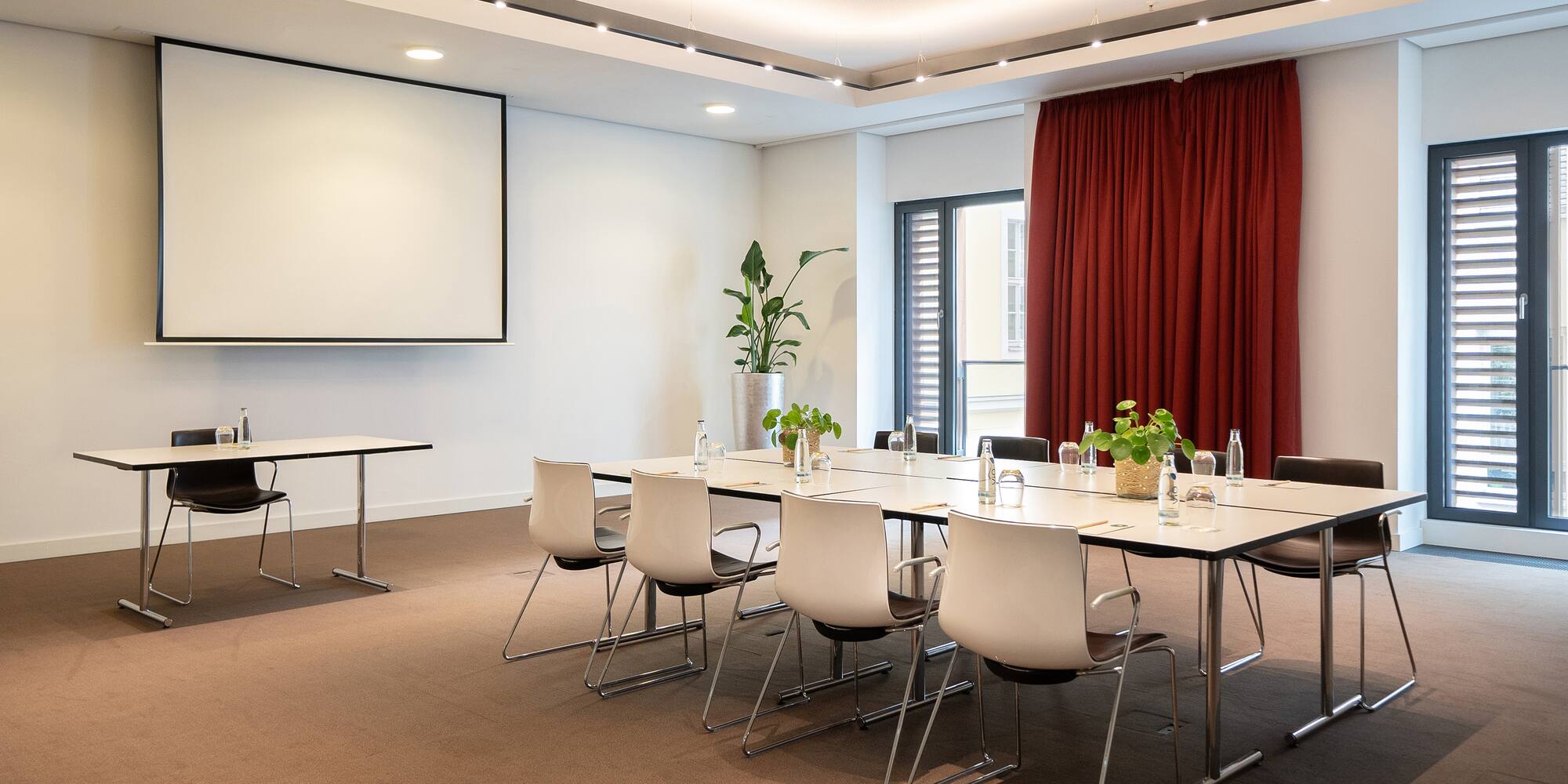 a room with a table and chairs