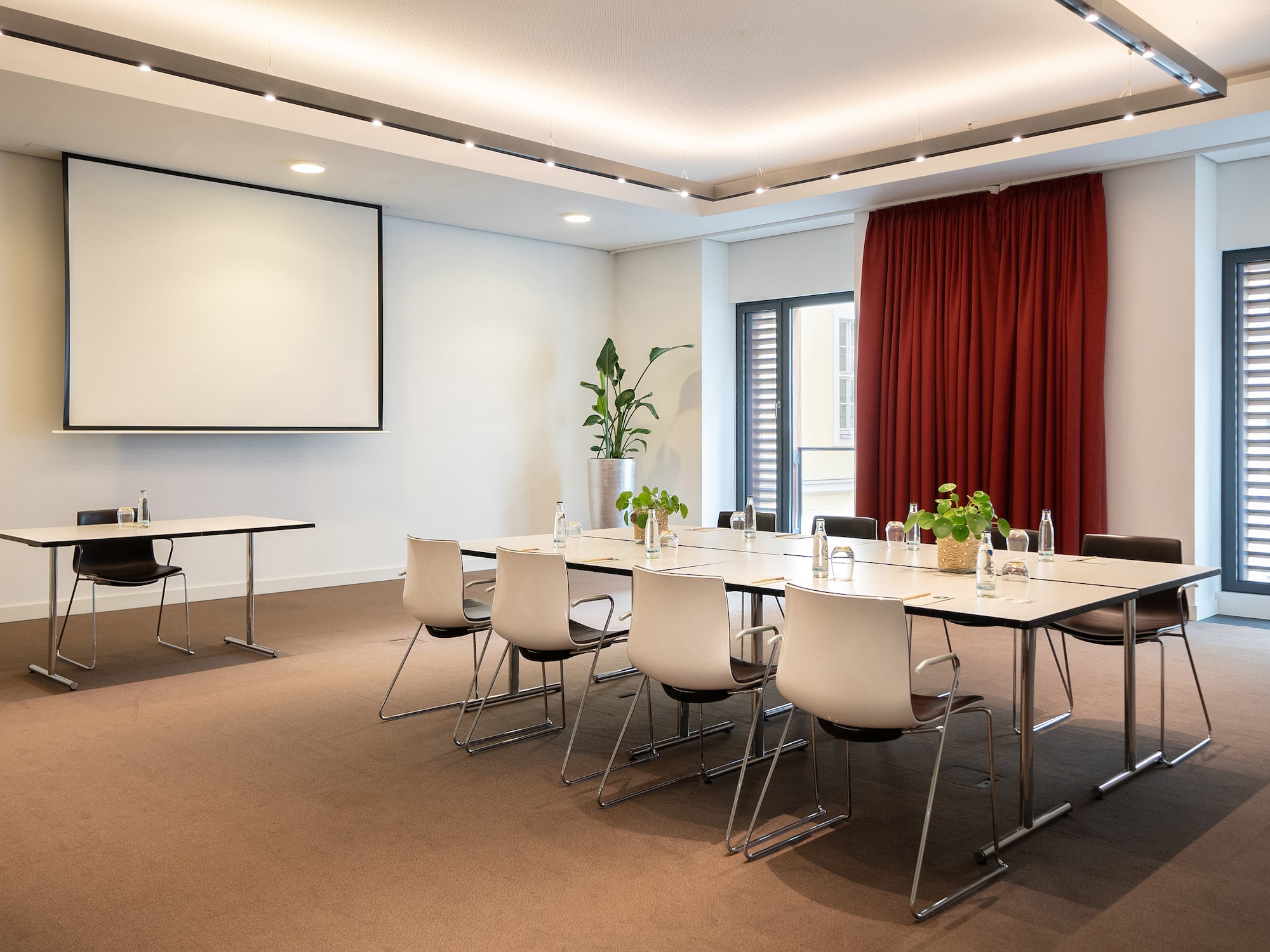 a room with a table and chairs