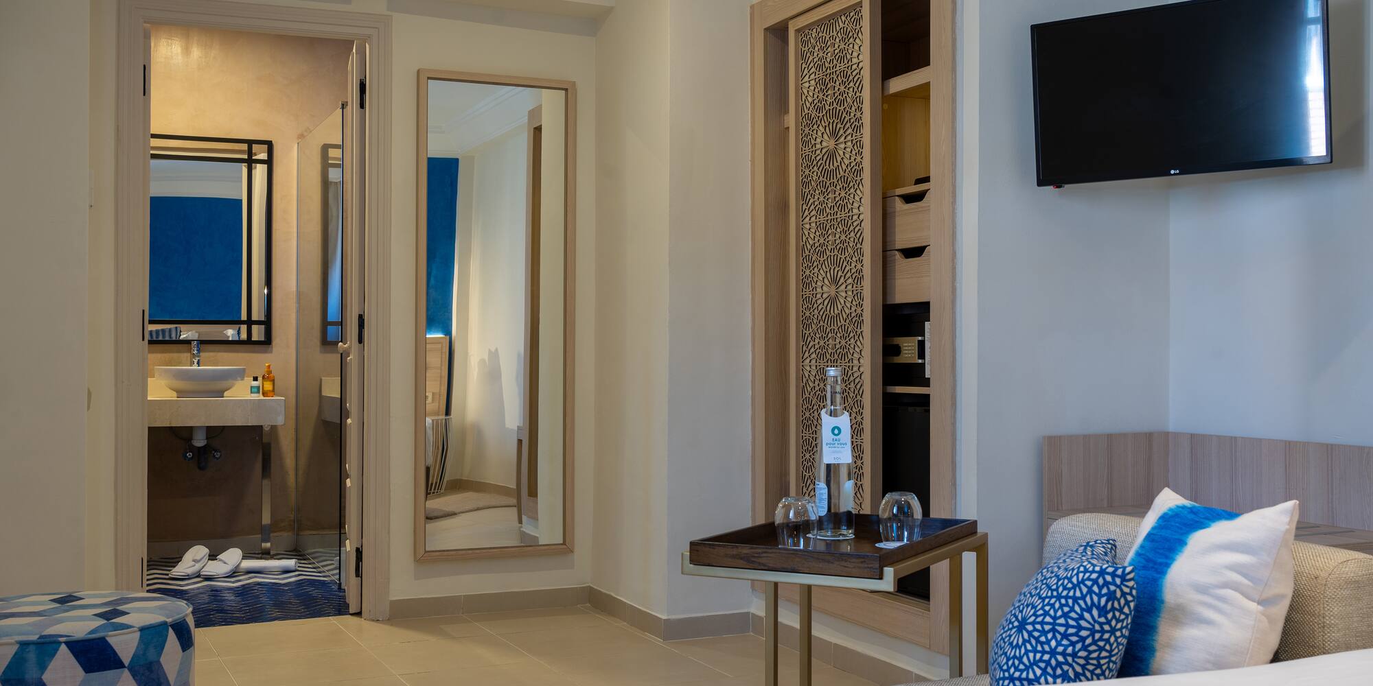 a room with a tv and a table