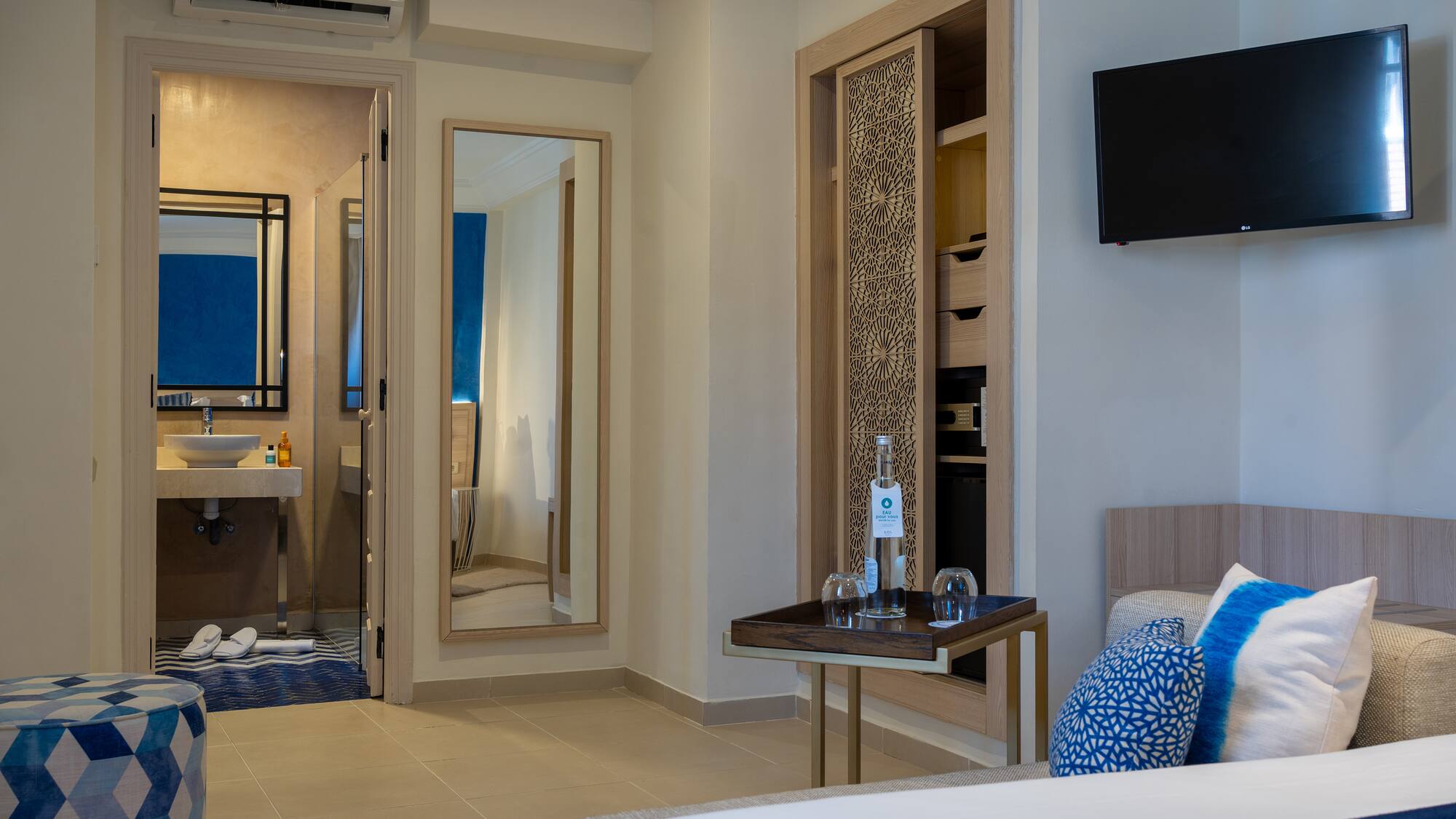 a room with a tv and a table