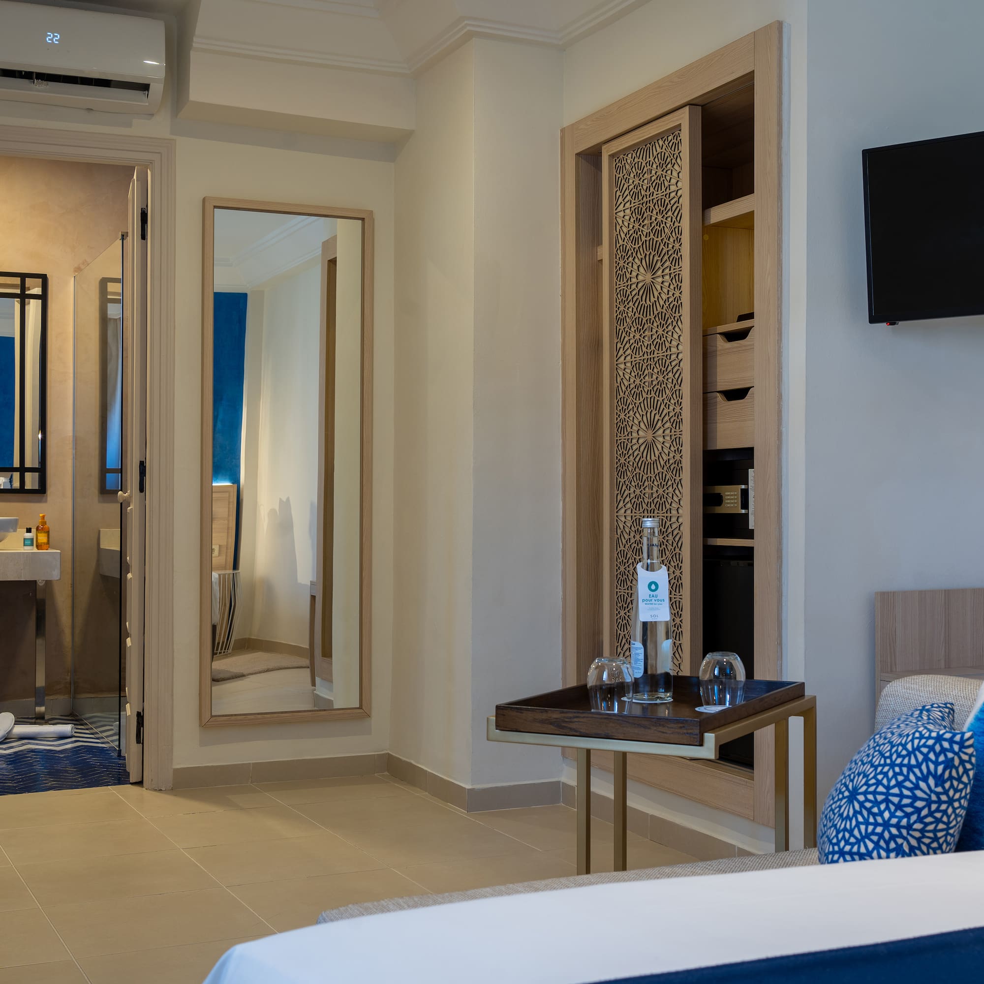 a room with a tv and a table