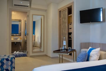 a room with a tv and a table