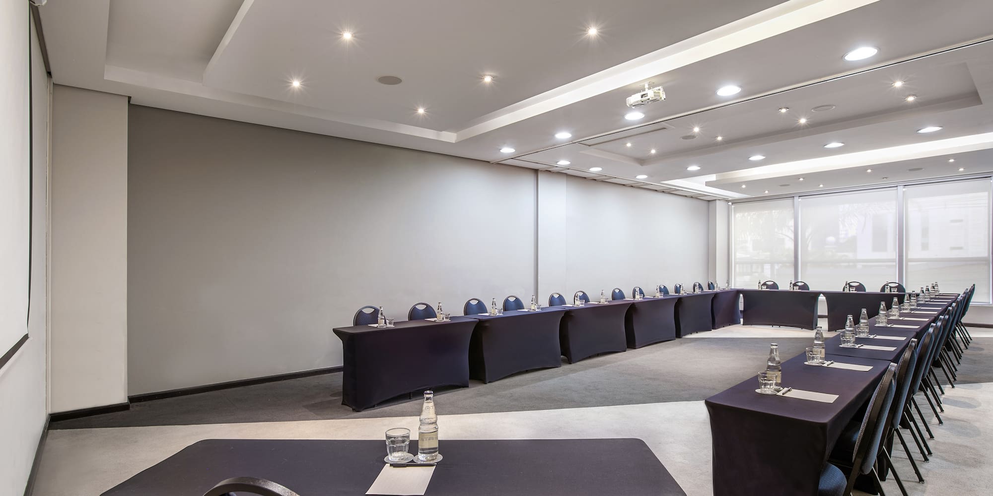 a room with tables and chairs