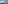 a mountain with clouds in the sky