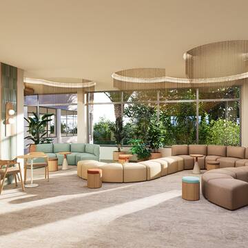 a room with large windows and a large couch