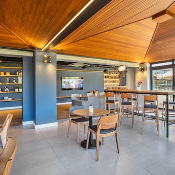 a room with a table and chairs