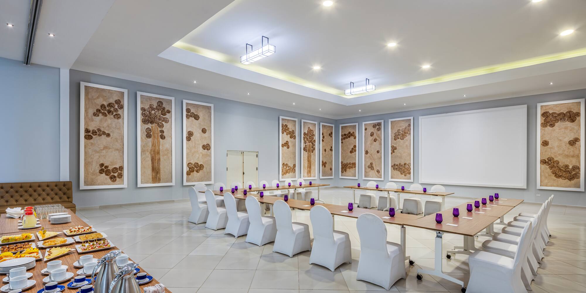 a room with a table and chairs