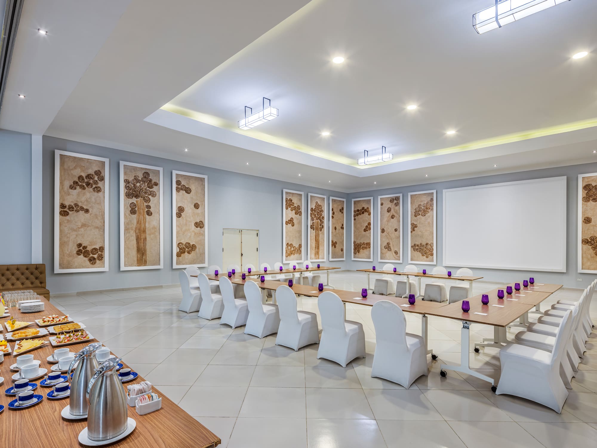 a room with a table and chairs