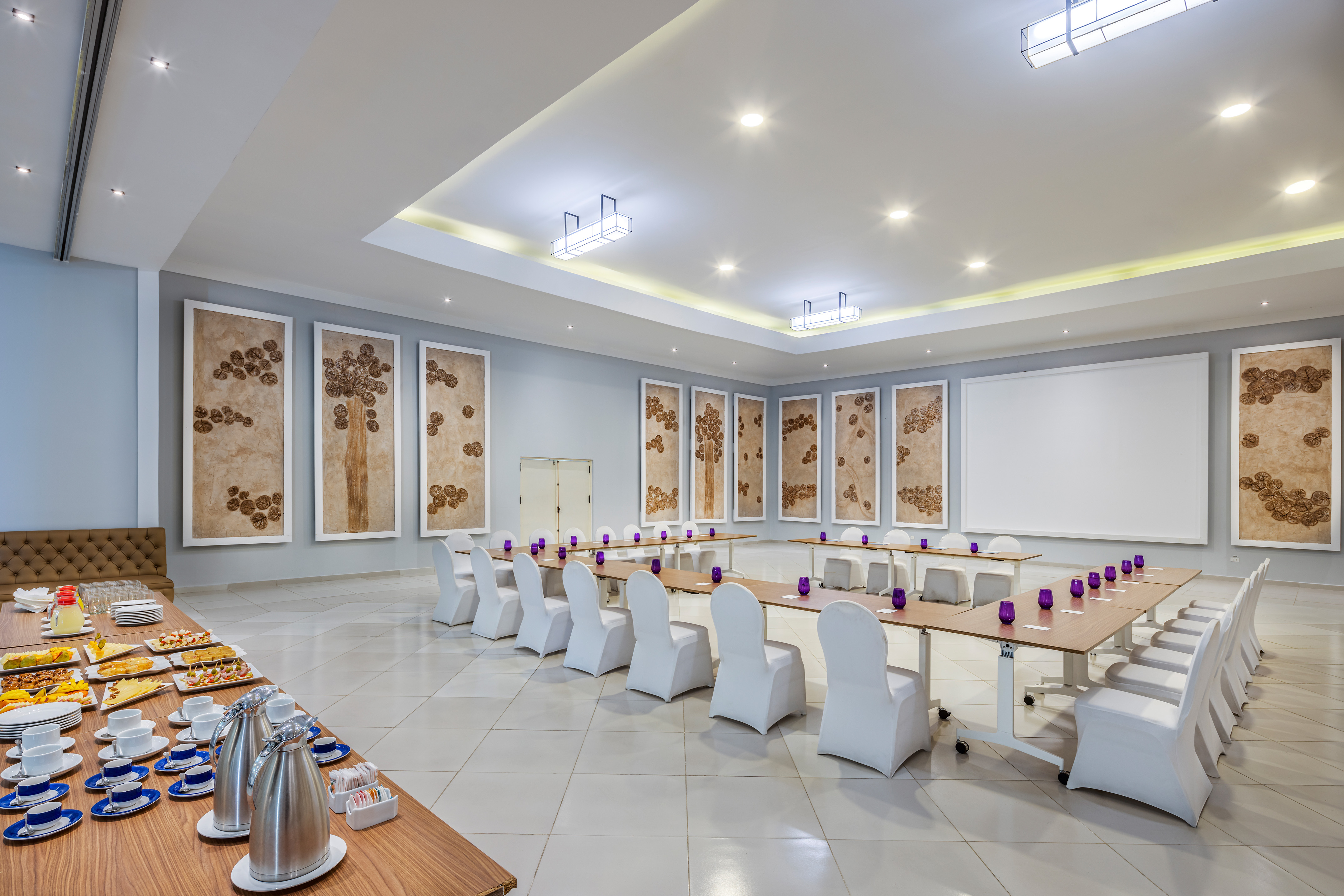 a room with a table and chairs