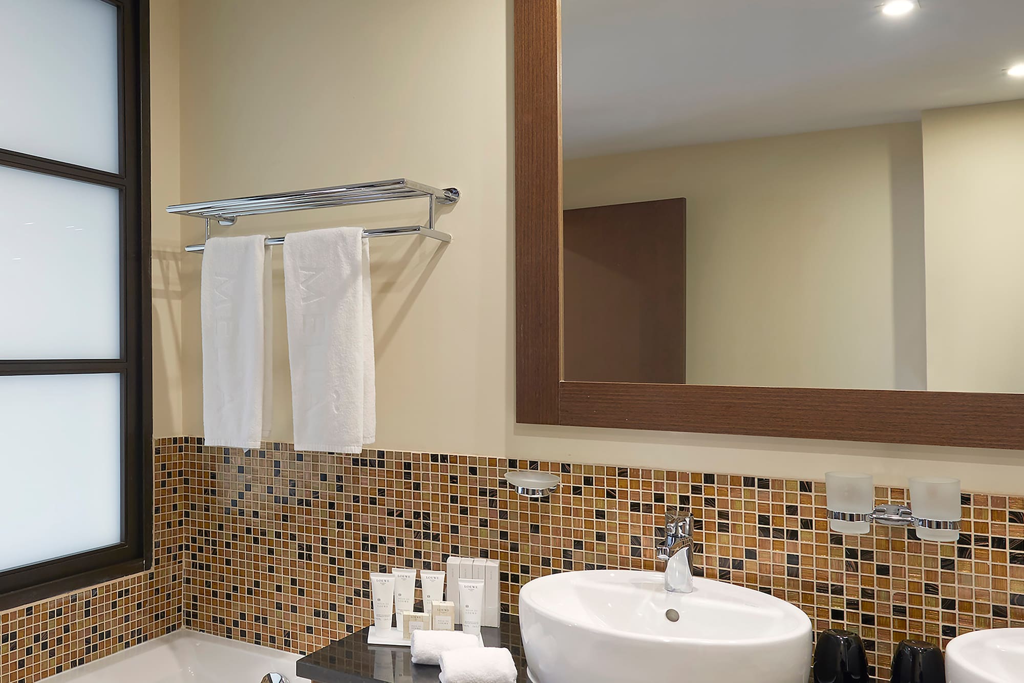 a bathroom with a sink and bathtub