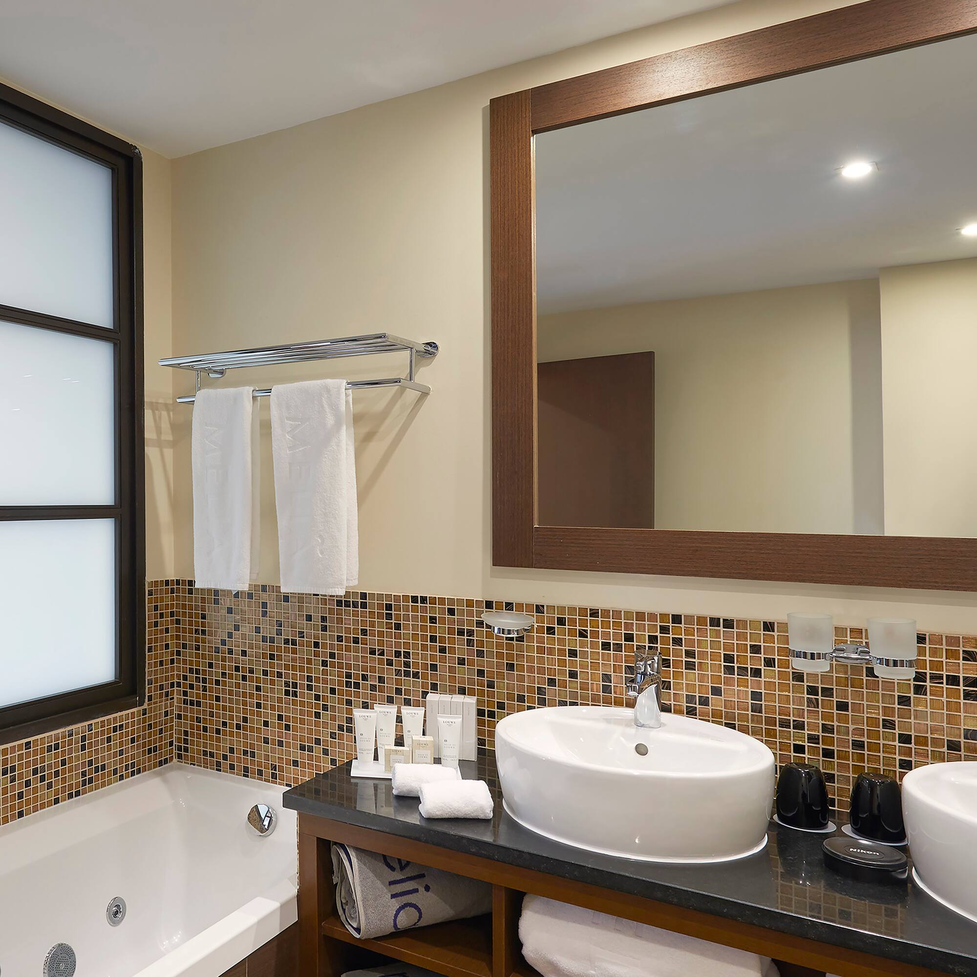 a bathroom with a sink and bathtub