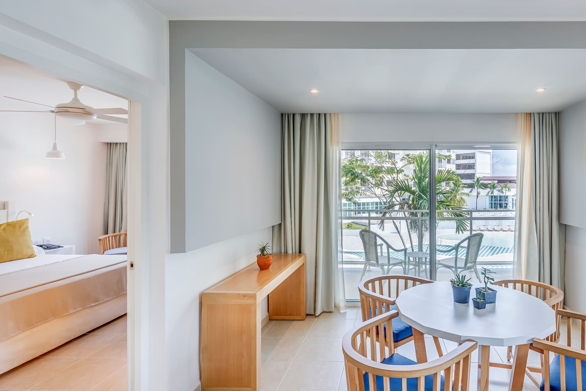 a room with a table and chairs