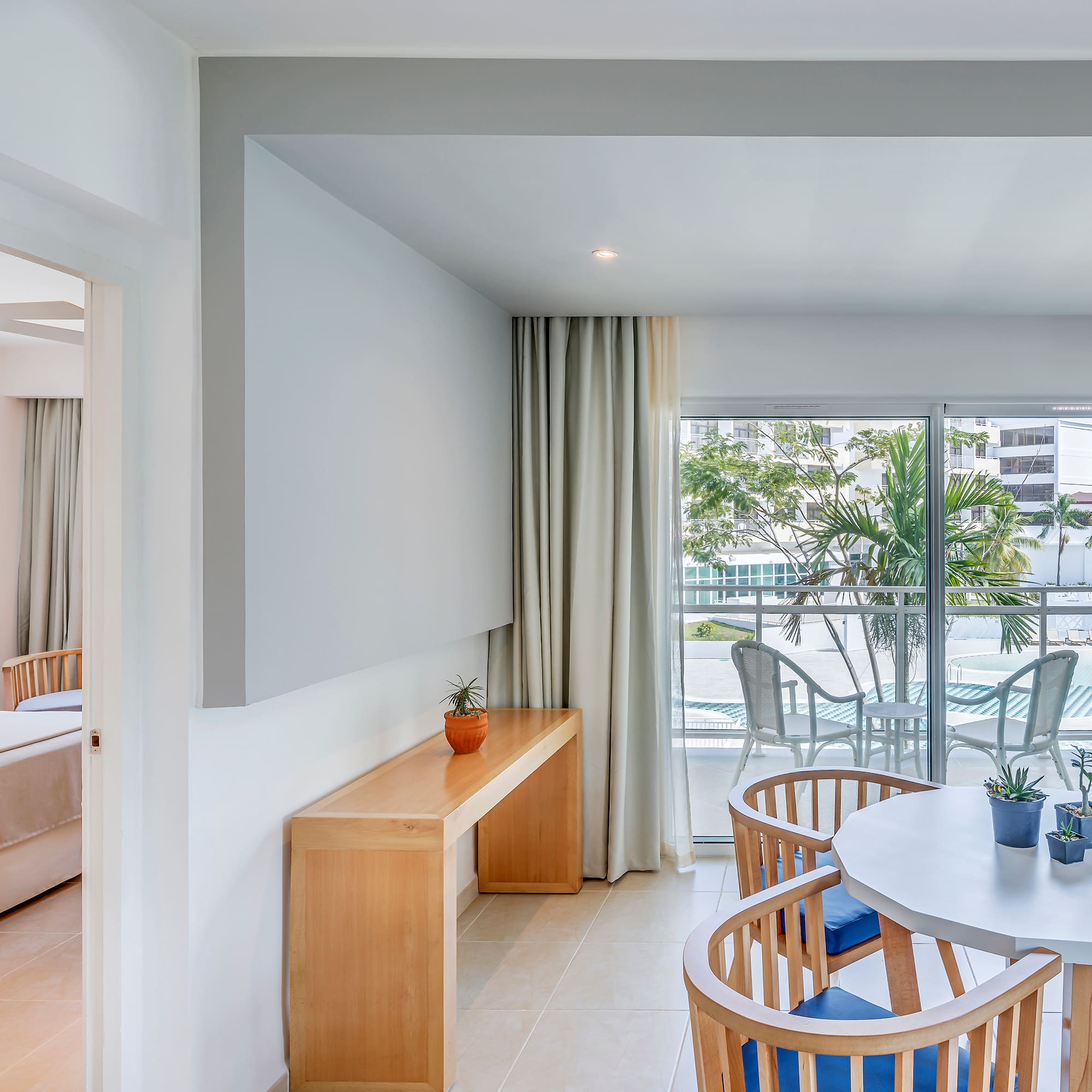 a room with a table and chairs