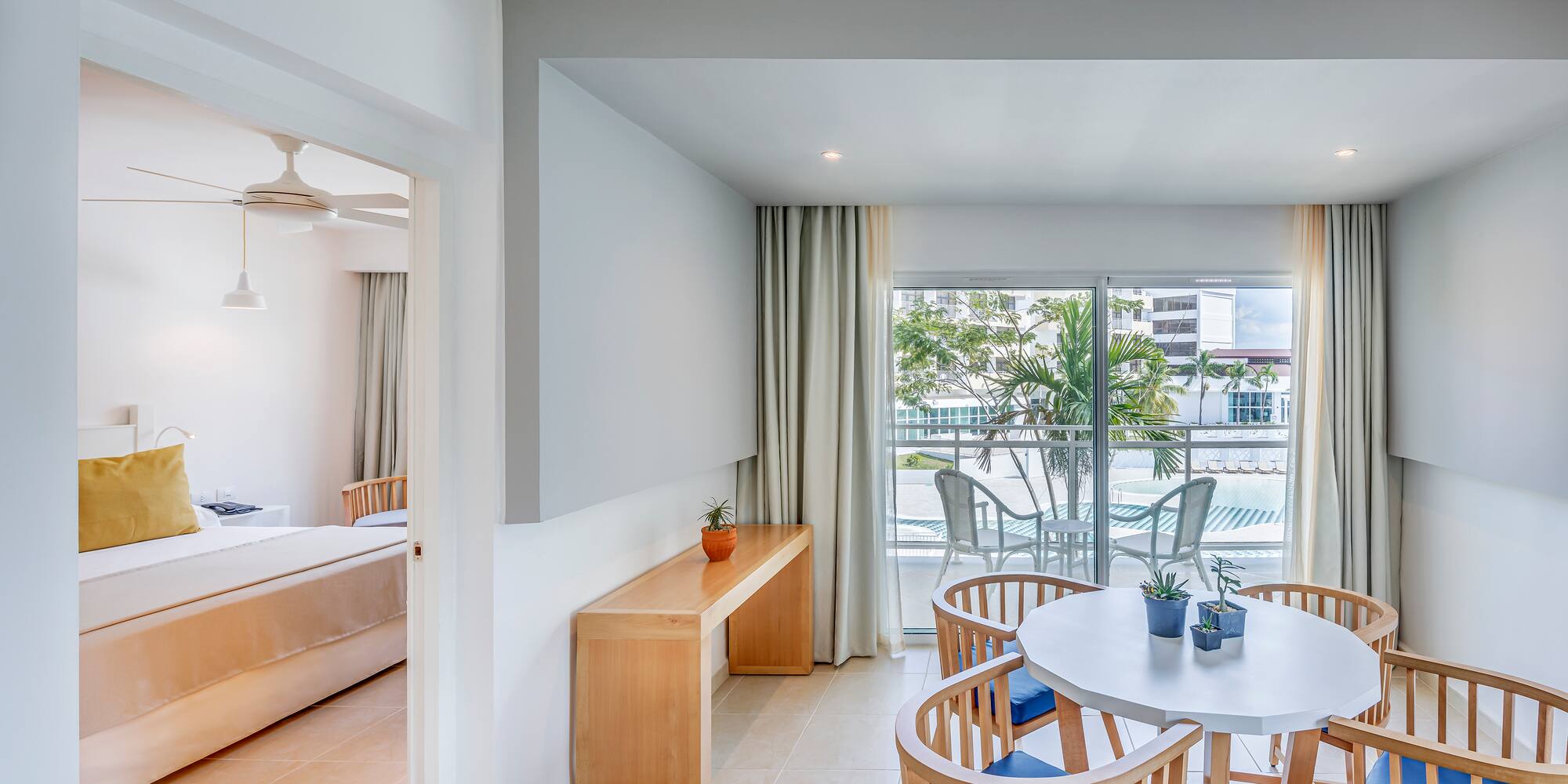 a room with a table and chairs