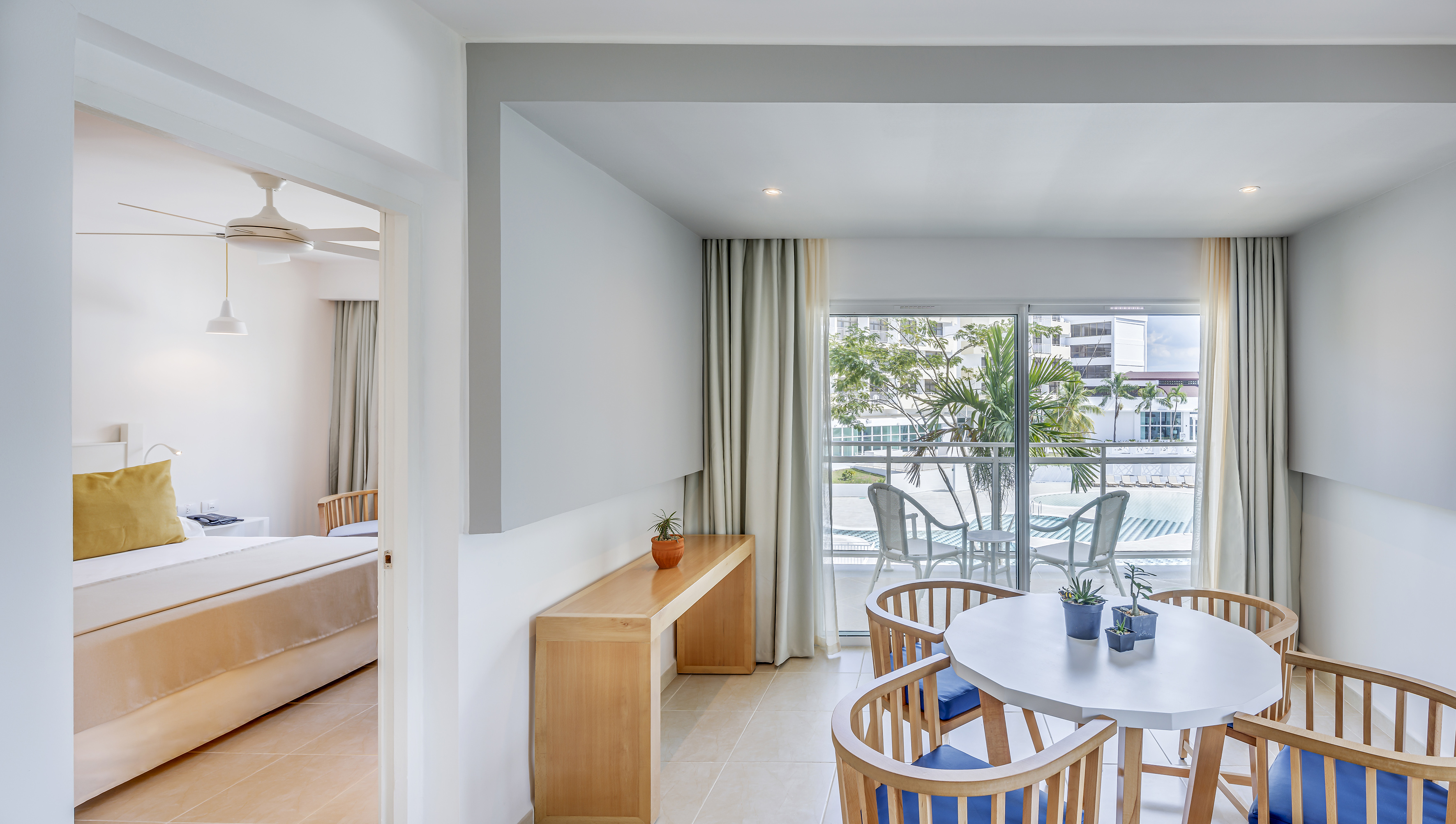 a room with a table and chairs