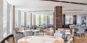 a room with tables and chairs