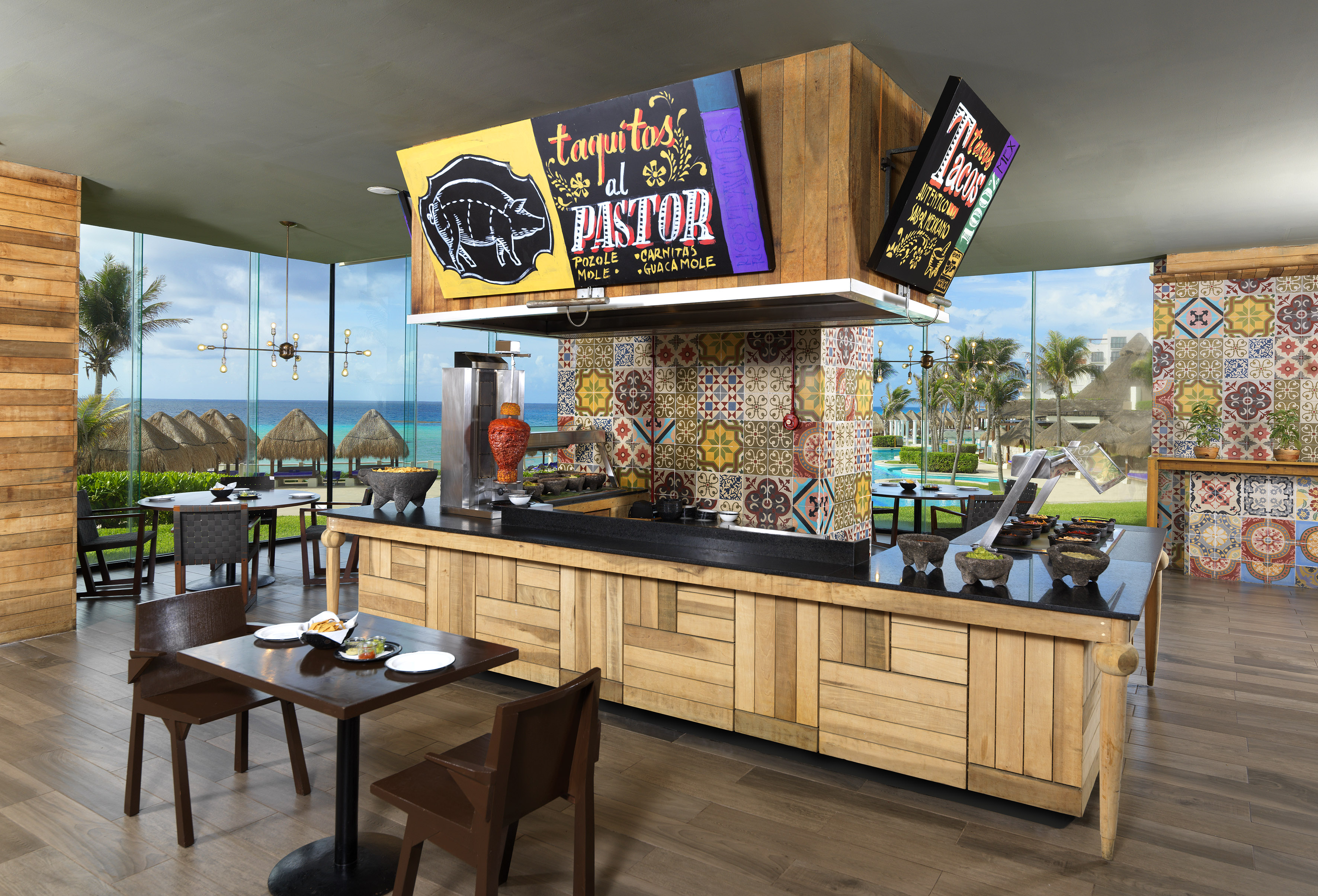 a restaurant with tables and chairs