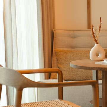 a table with a vase of flowers on it