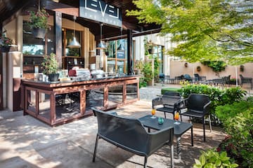 a patio with chairs and tables
