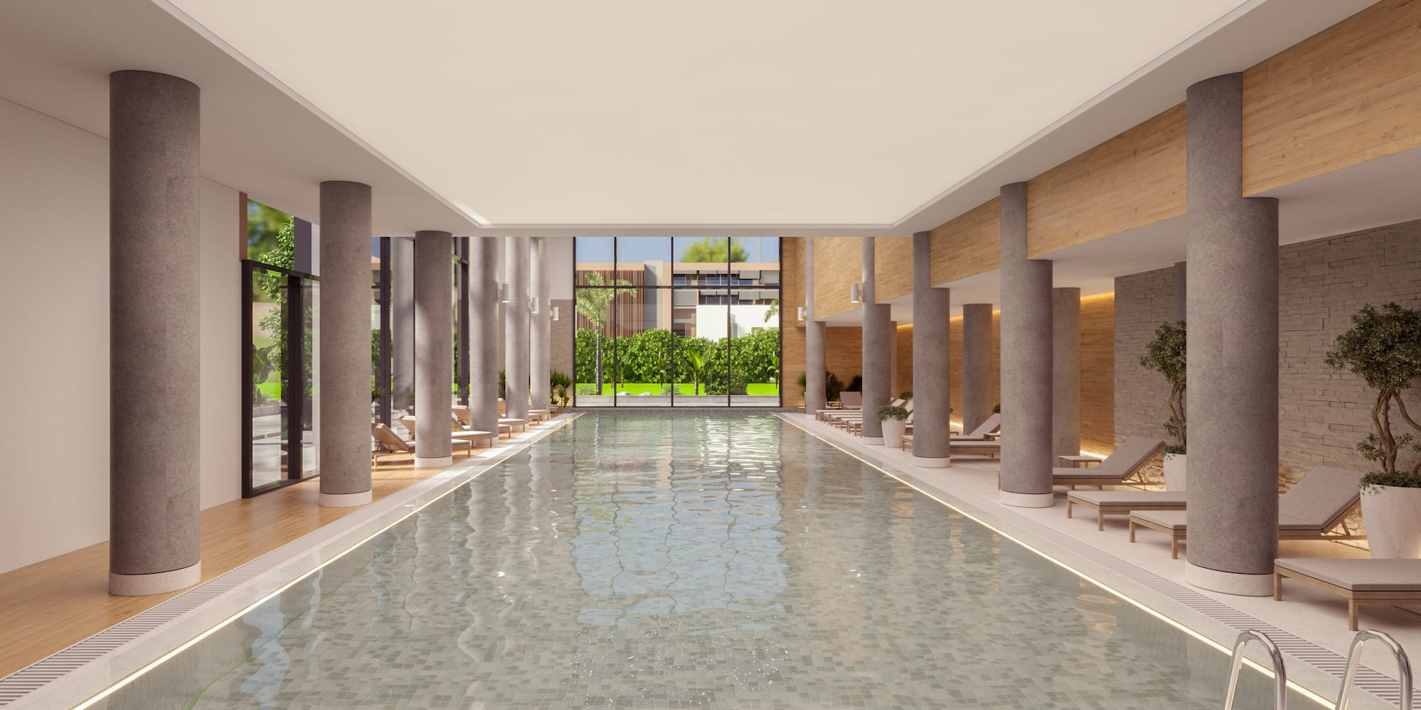 a large indoor pool with columns and a large walkway