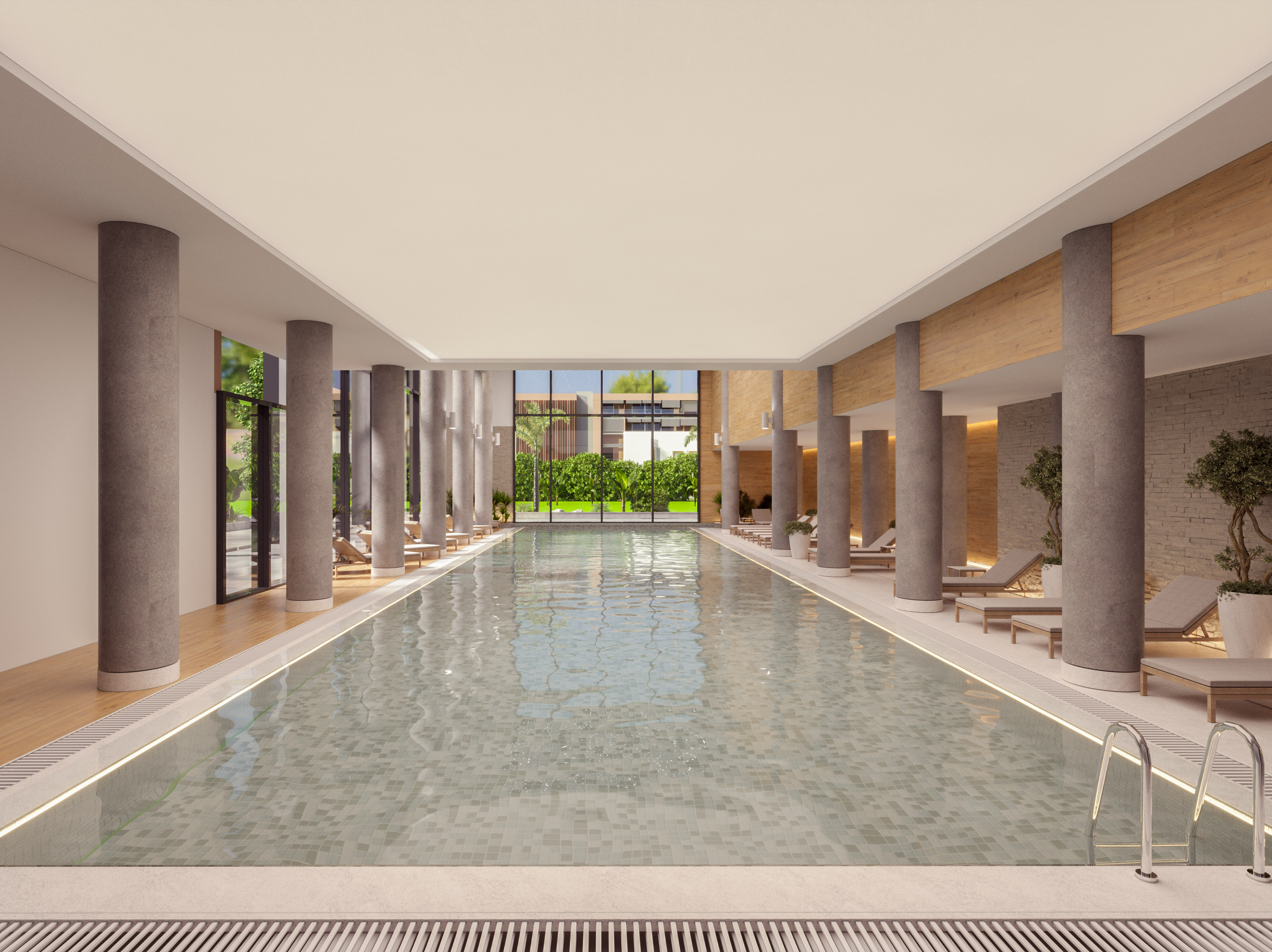 a large indoor pool with columns and a large walkway