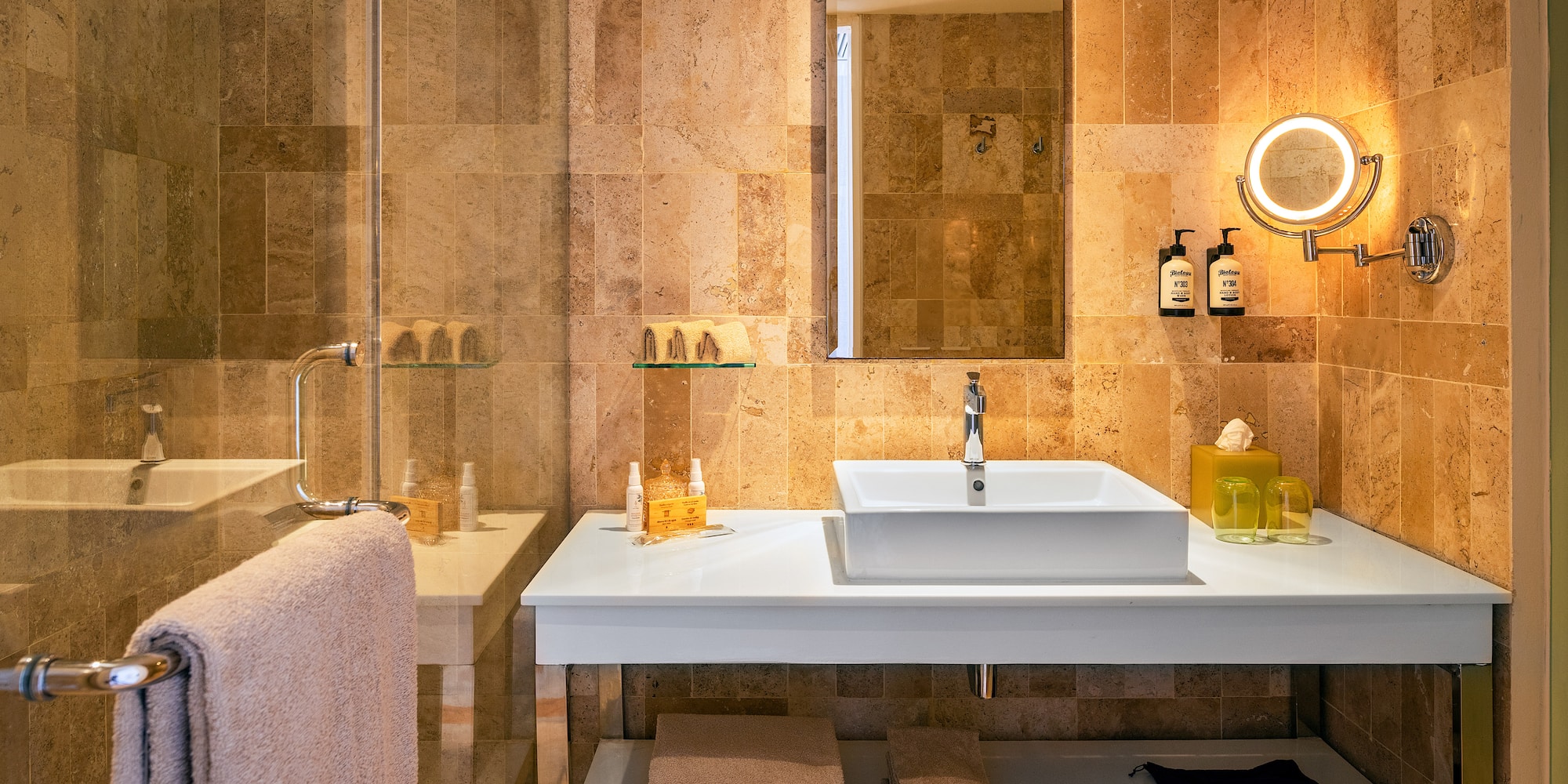 a bathroom with a mirror and sink