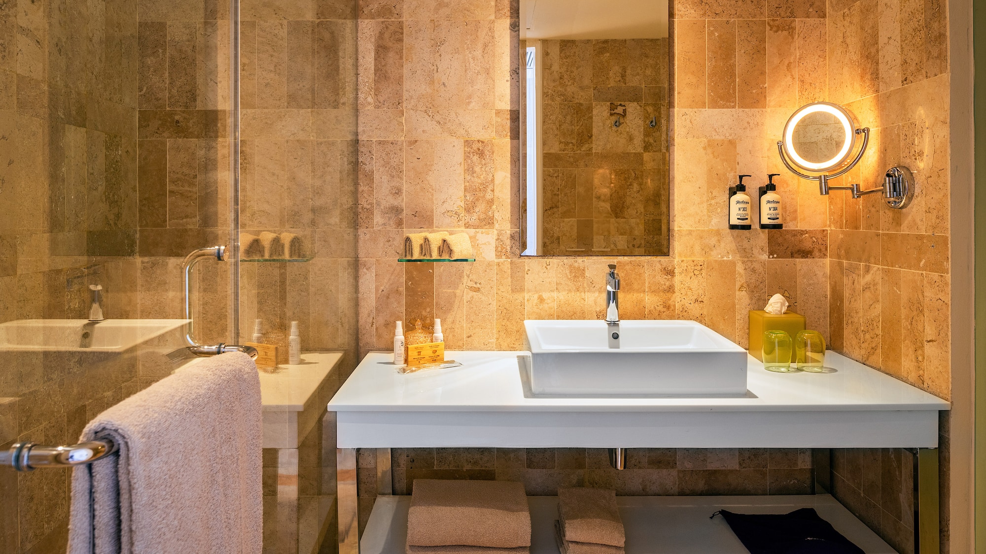 a bathroom with a mirror and sink